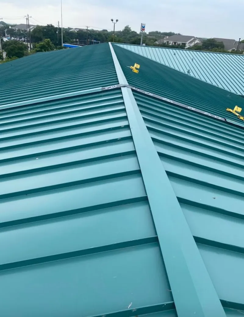 Green commercial metal roof ridge and valley for Metal Roof Repair in Langley Park
